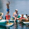 This Giant Curved Inflatable Dock Holds Up To 6 Adults and a Cooler