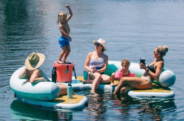 This Giant Curved Inflatable Dock Holds Up To 6 Adults and a Cooler